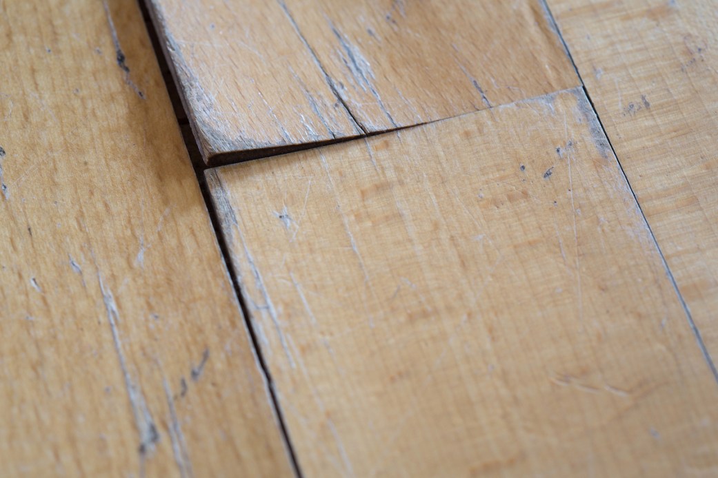 How to Repair Laminate Flooring: 5 Problems, Solved