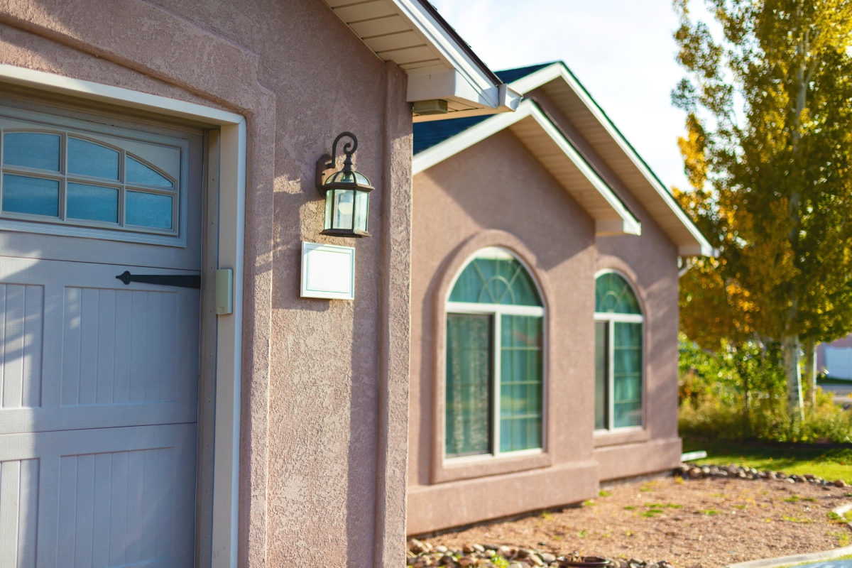 A single family home with stucco exterior walls.