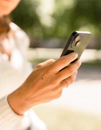 A close up of a person holding up their smart phone. 