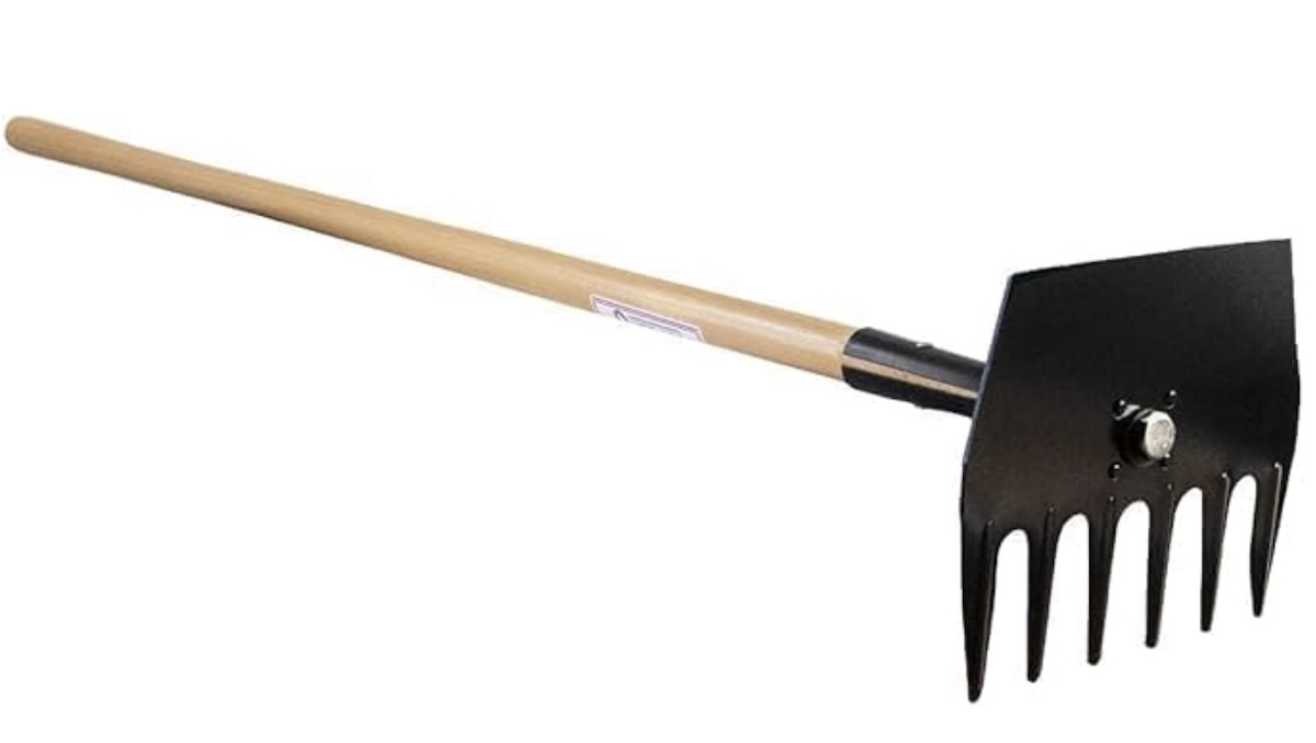 Fire rake with steel head and wooden handle.