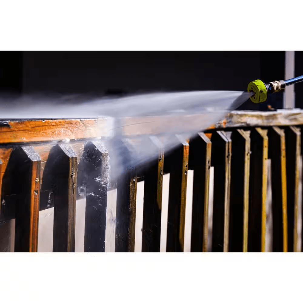 A person pressure washing a deck with Ecolab deck cleaner from The Home Depot.