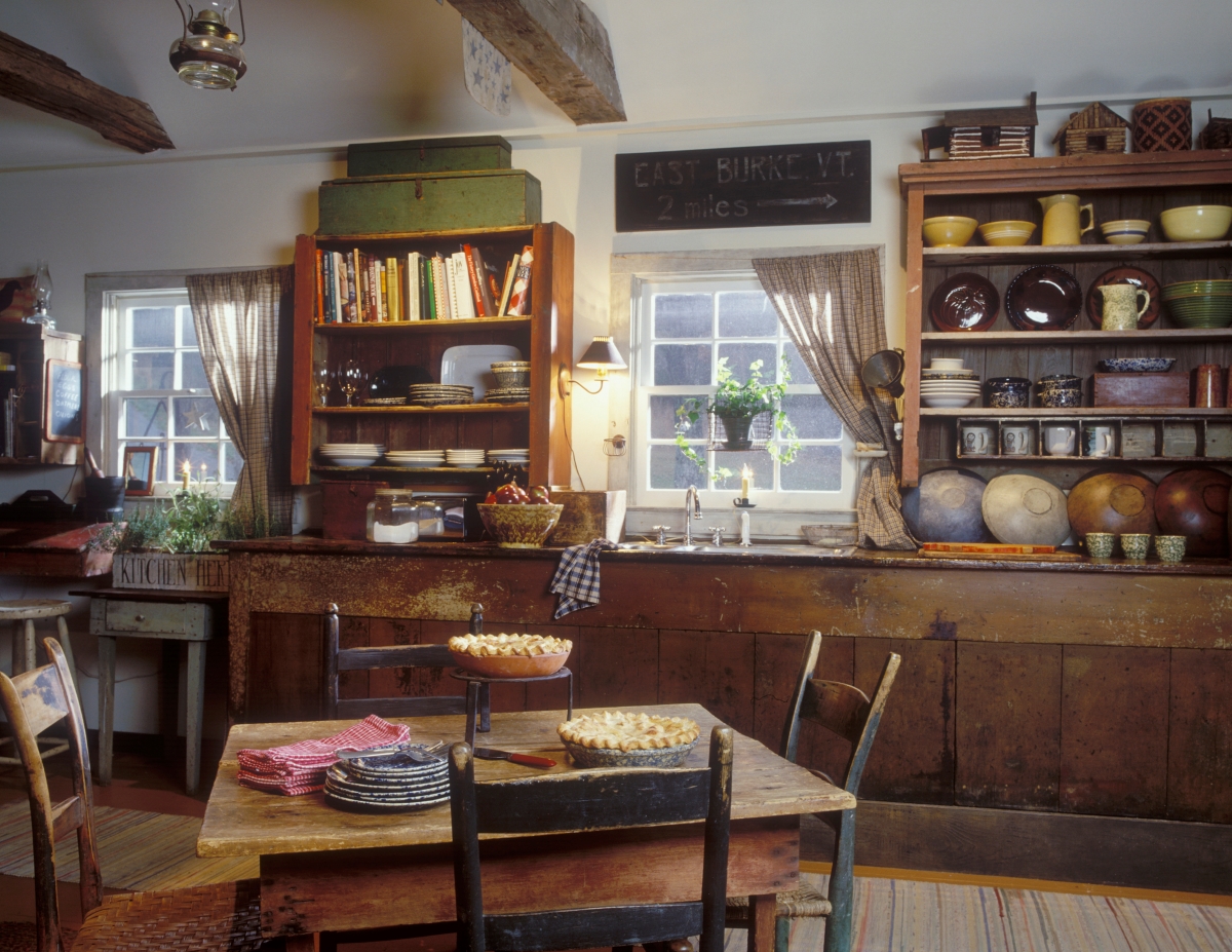 A rustic kitchen made with salvaged antique wood.