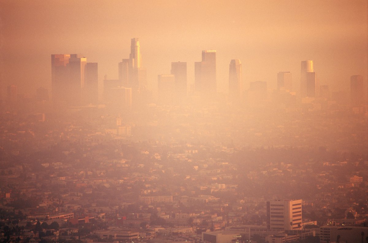 City covered in orange-looking air due to air pollution.