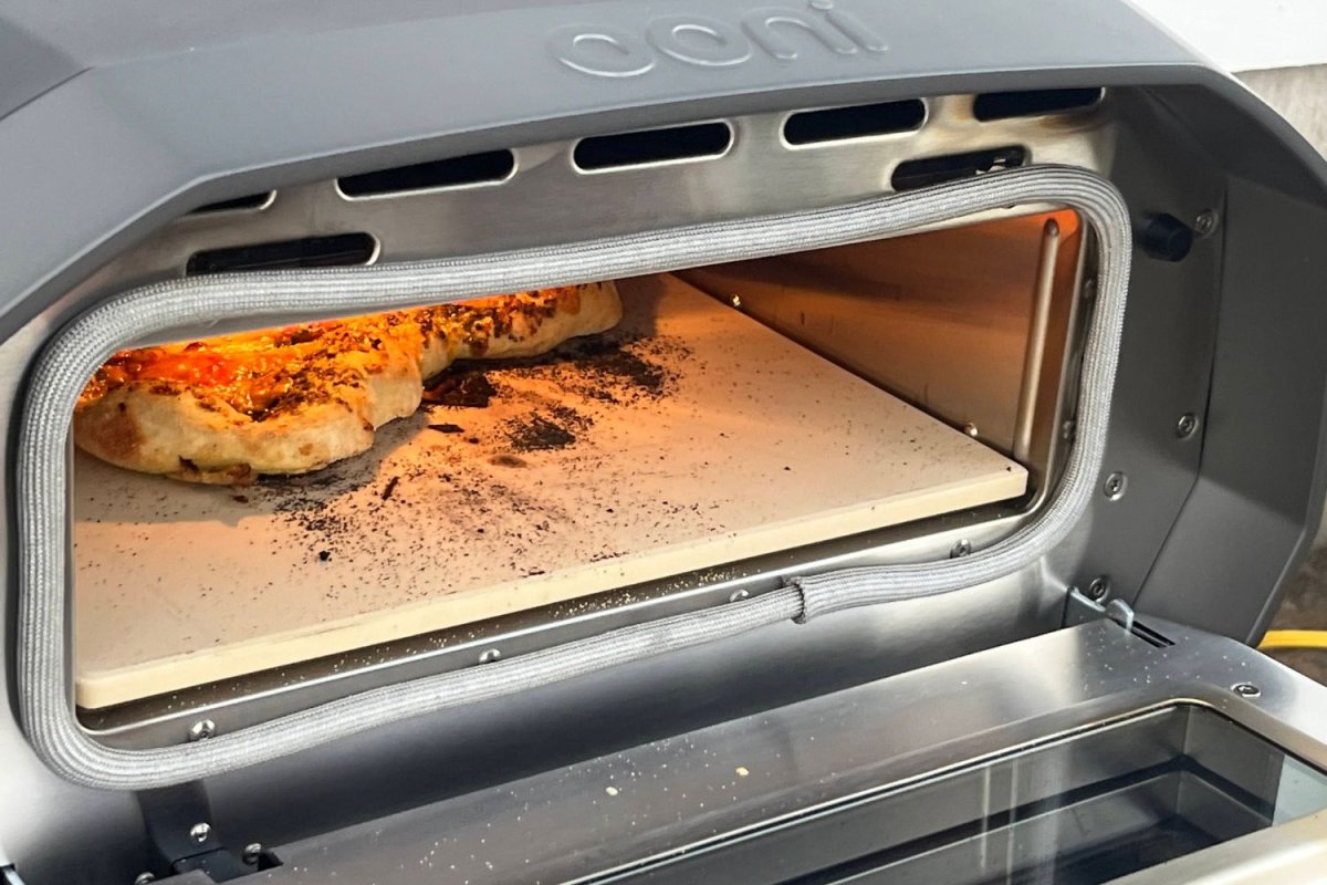 Pizza cooking inside the Ooni Volt 12 Pizza Oven