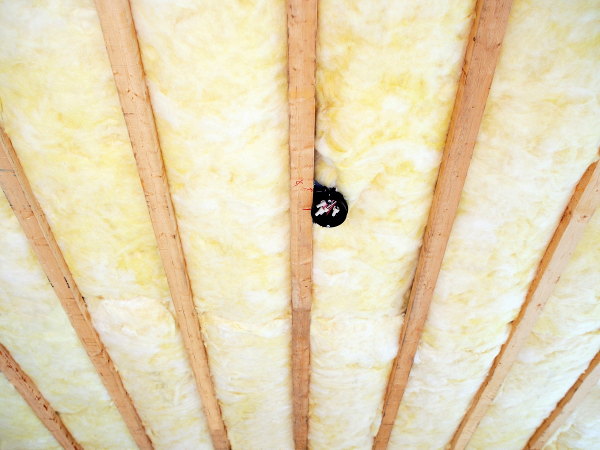 Insulation installed between ceiling joists.