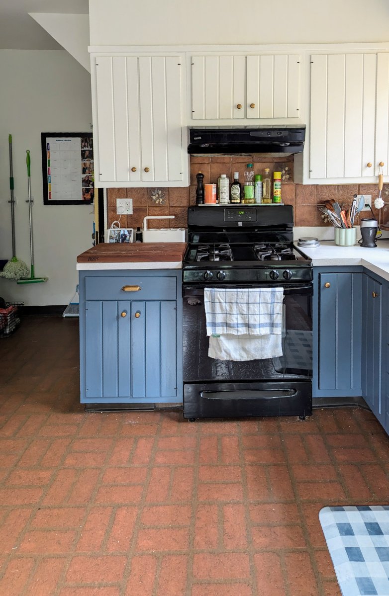 Vinyl kitchen floor in brick design near the oven