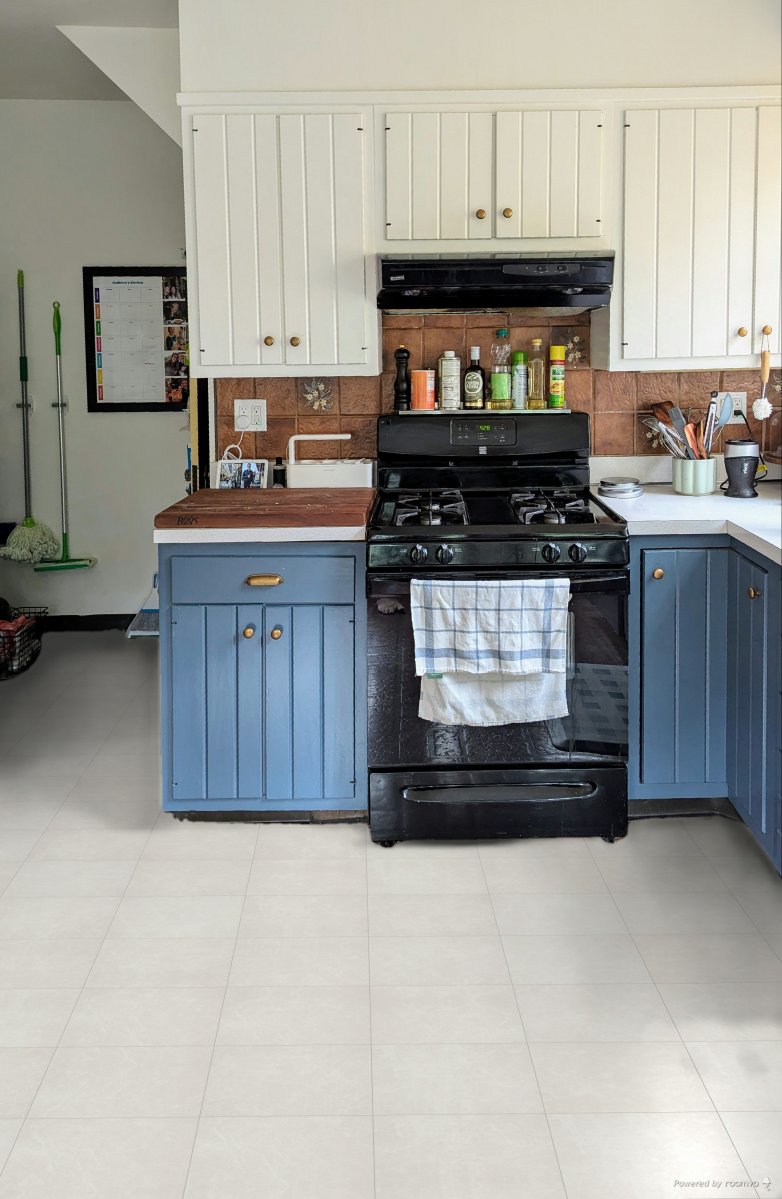 Kitchen floor near oven reimagined with Tundra Stone flooring from Empire Today