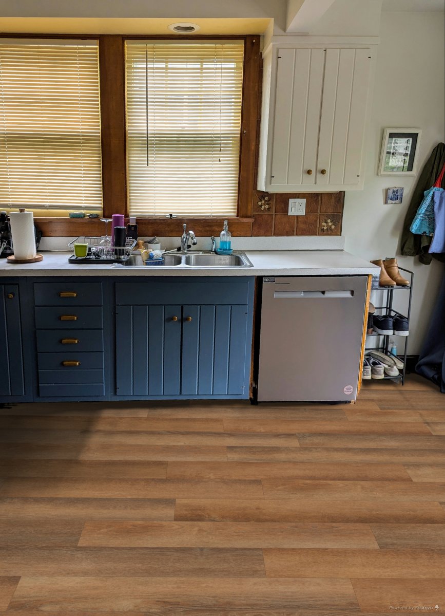 Kitchen floor near sink and dishwasher reimagined with Knoll Creek flooring from Empire Today