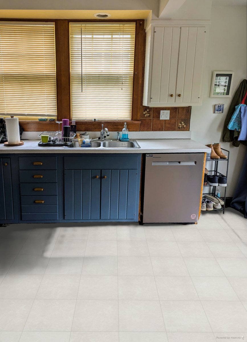 Kitchen floor near sink and dishwasher reimagined with Tundra Stone flooring from Empire Today