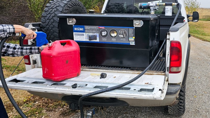 Using transfer tank to fill up portable fuel can