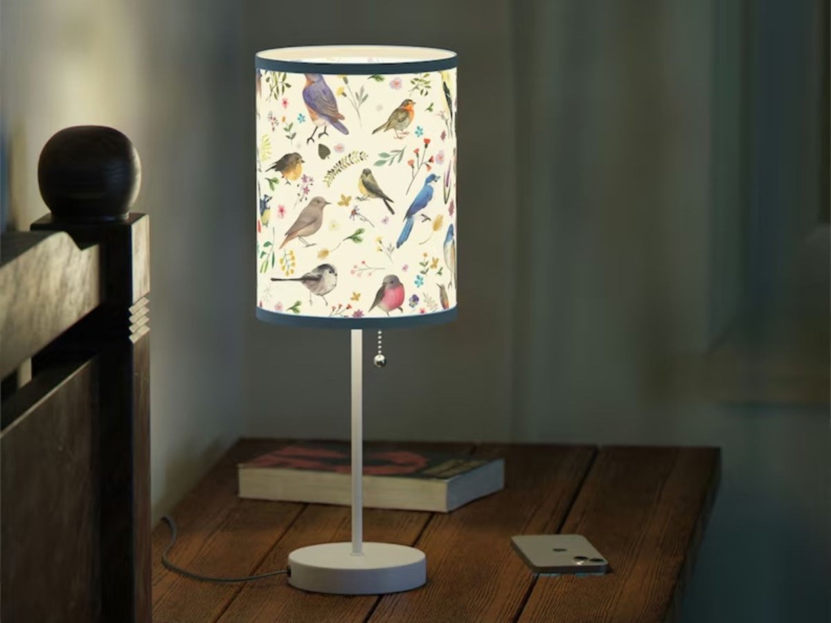 a lamp on a desk in a room 