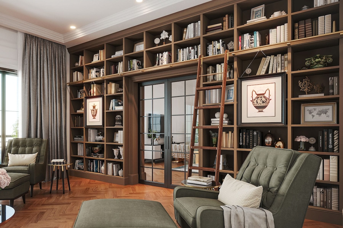 A large wall of build-in bookshelves in a home office.