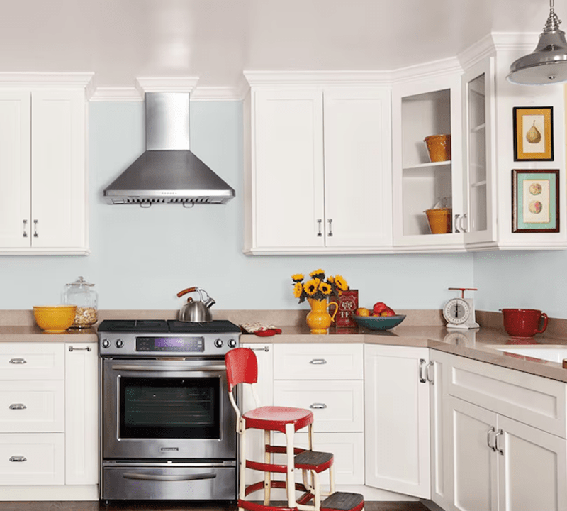 Sherwin-Williams Olympus White neutral paint color on a kitchen wall.