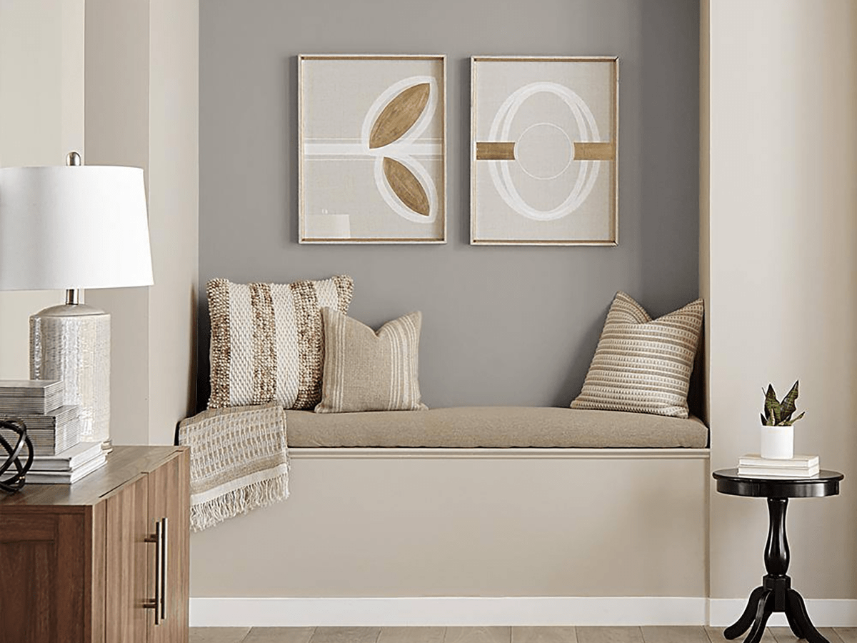 Behr Essential Gray as one of the best neutral paint colors on a living room wall.