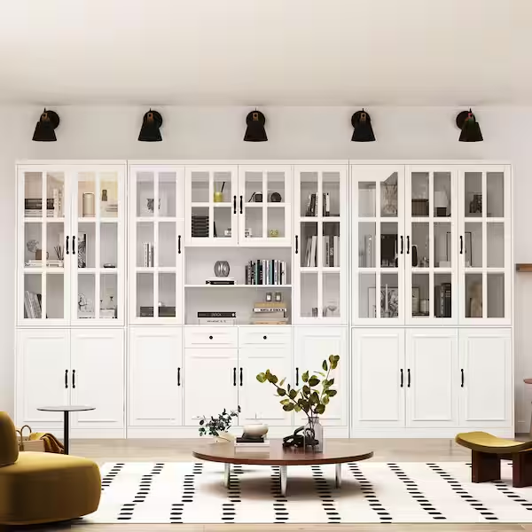 White built-in bookshelf ideas in a living room.