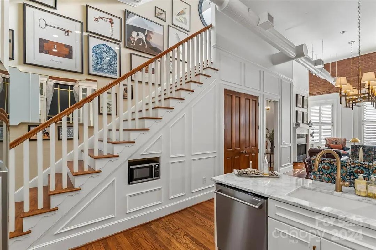 Traditional wallpaper installed along a staircase.