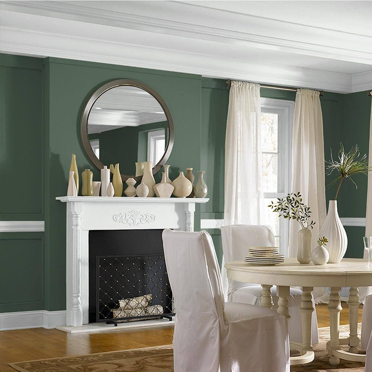 Behr Vine Leaf, one of the best green paint colors, on a dining room wall.