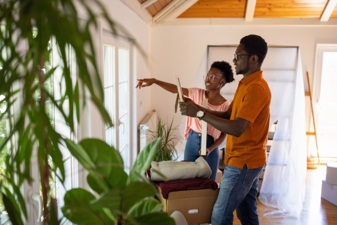 Young couple working on improving their home.