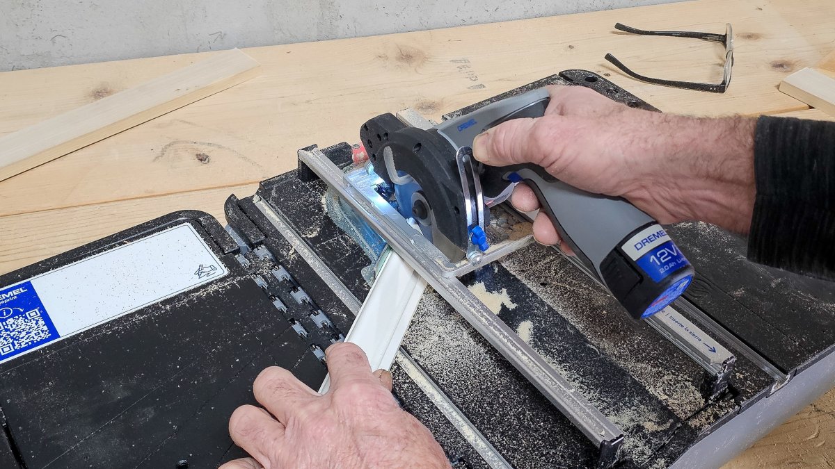 Making a miter cut on the Dremel Blueprint Portable Saw Station