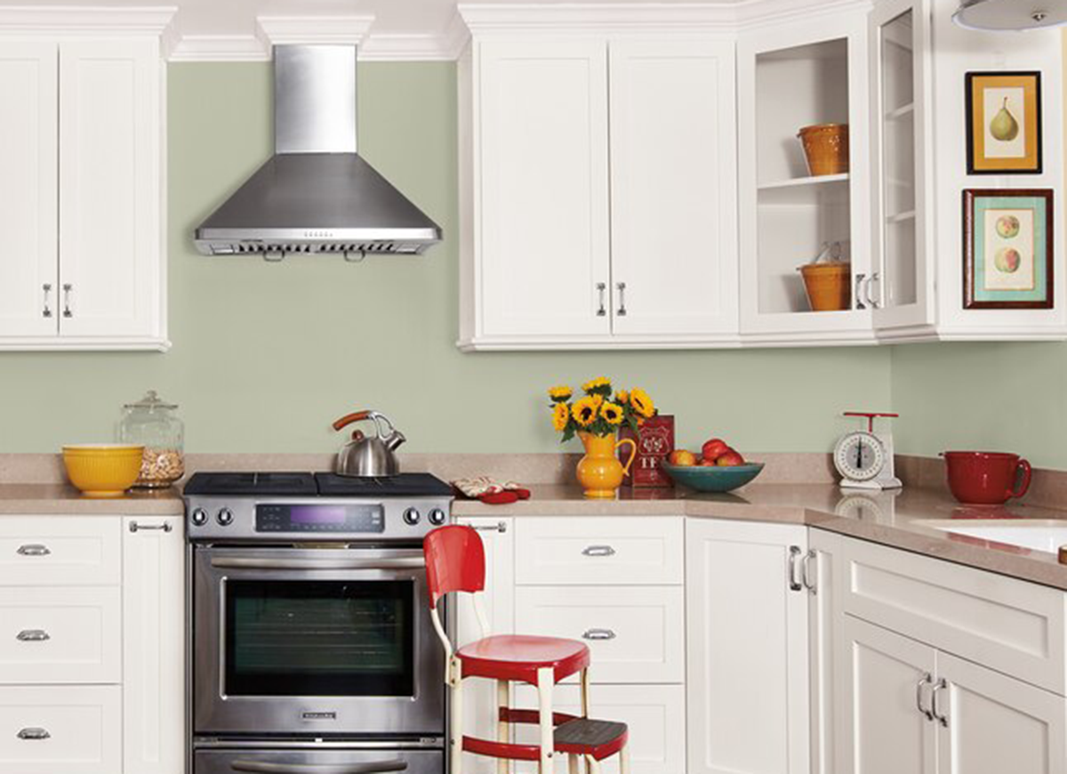 Sherwin-Williams's Softened Gray painted on a kitchen backsplash wall.