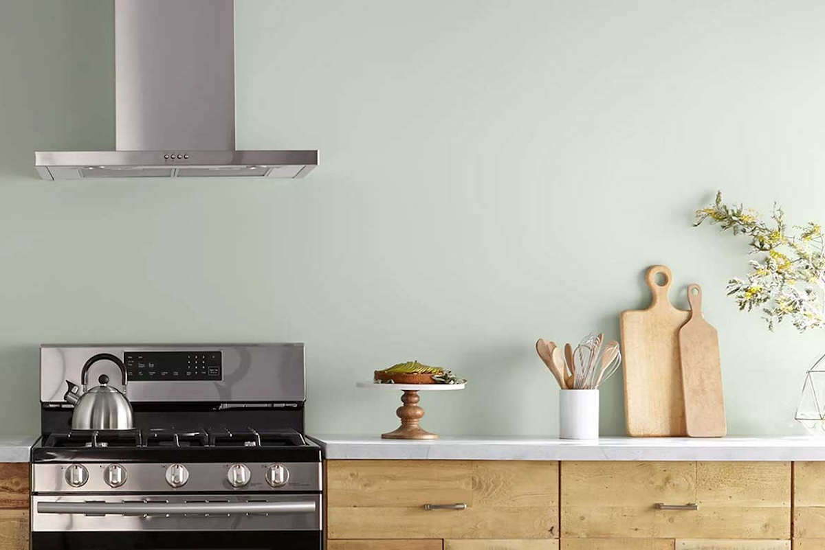 A kitchen wall painted in Sparkling Sage, one of the best green paint colors.