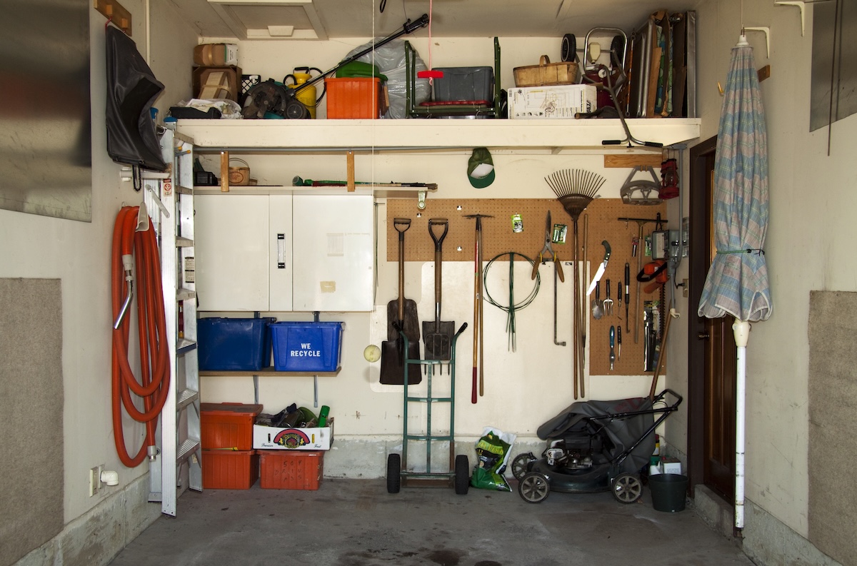 An organized home garage insulated for storing power tool batteries during winter.