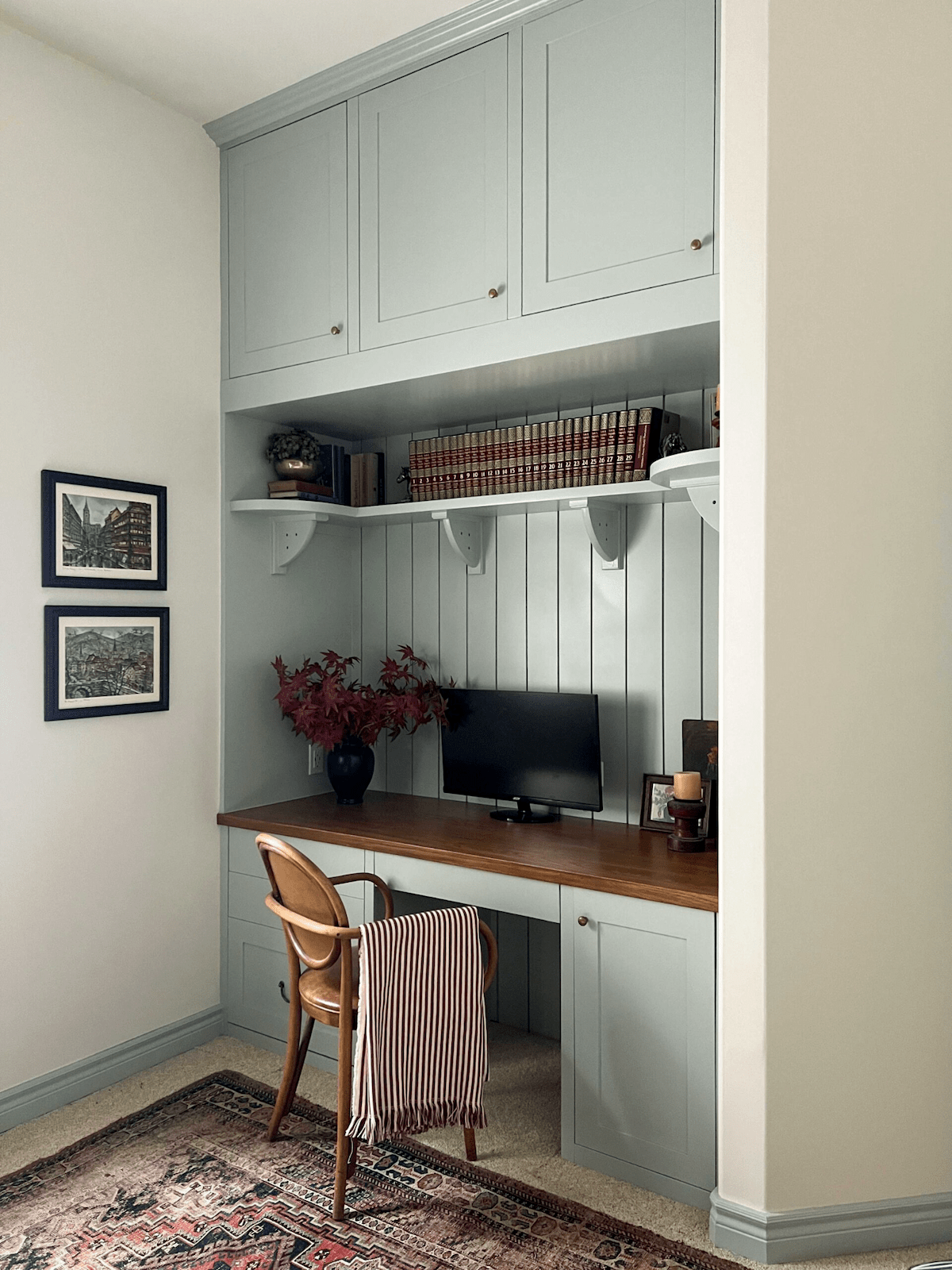 A built-in desk made with stock cabinets.