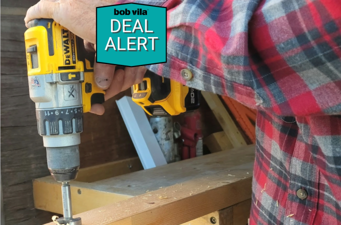 Man using DeWalt drill with 20v battery