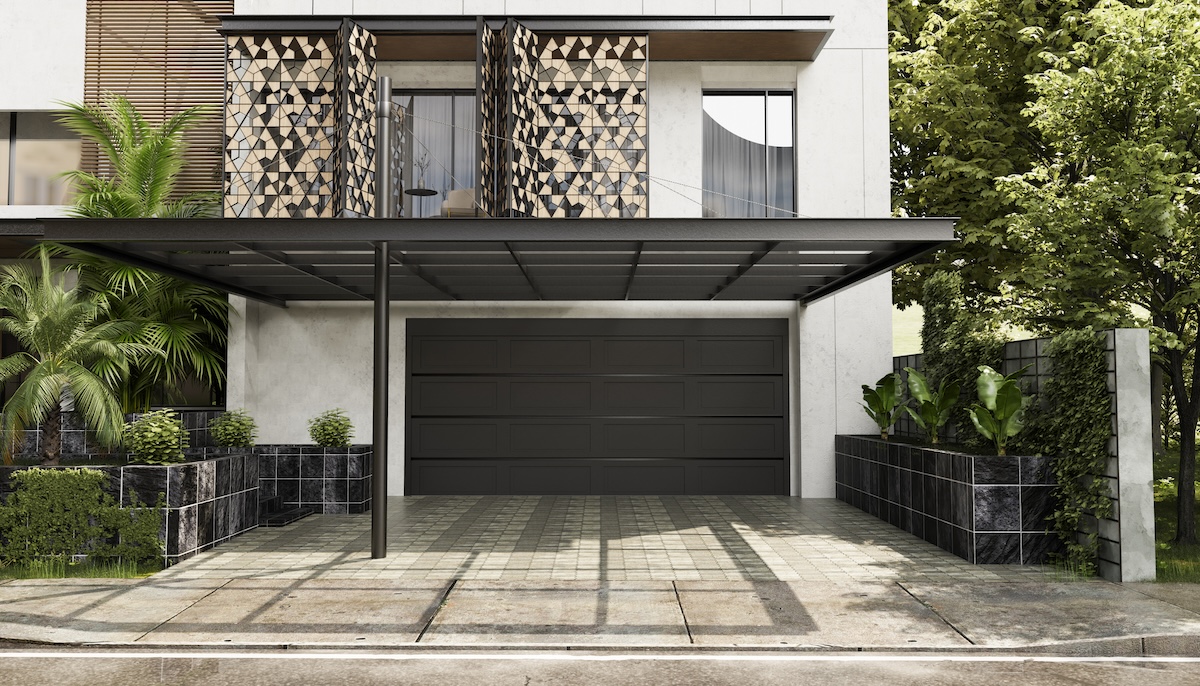 A white and grey modern home with a flat garage overhang.